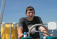 Alex at helm