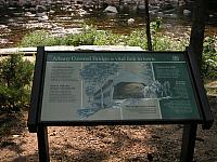 Sign at covered bridge